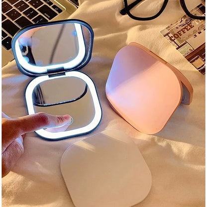 Lumea™ - Espejo compacto recargable con luz led, aumento y doble cara 🪞