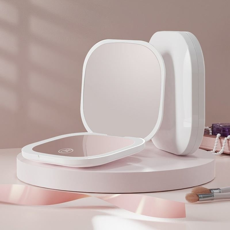 Lumea™ - Espejo compacto recargable con luz led, aumento y doble cara 🪞