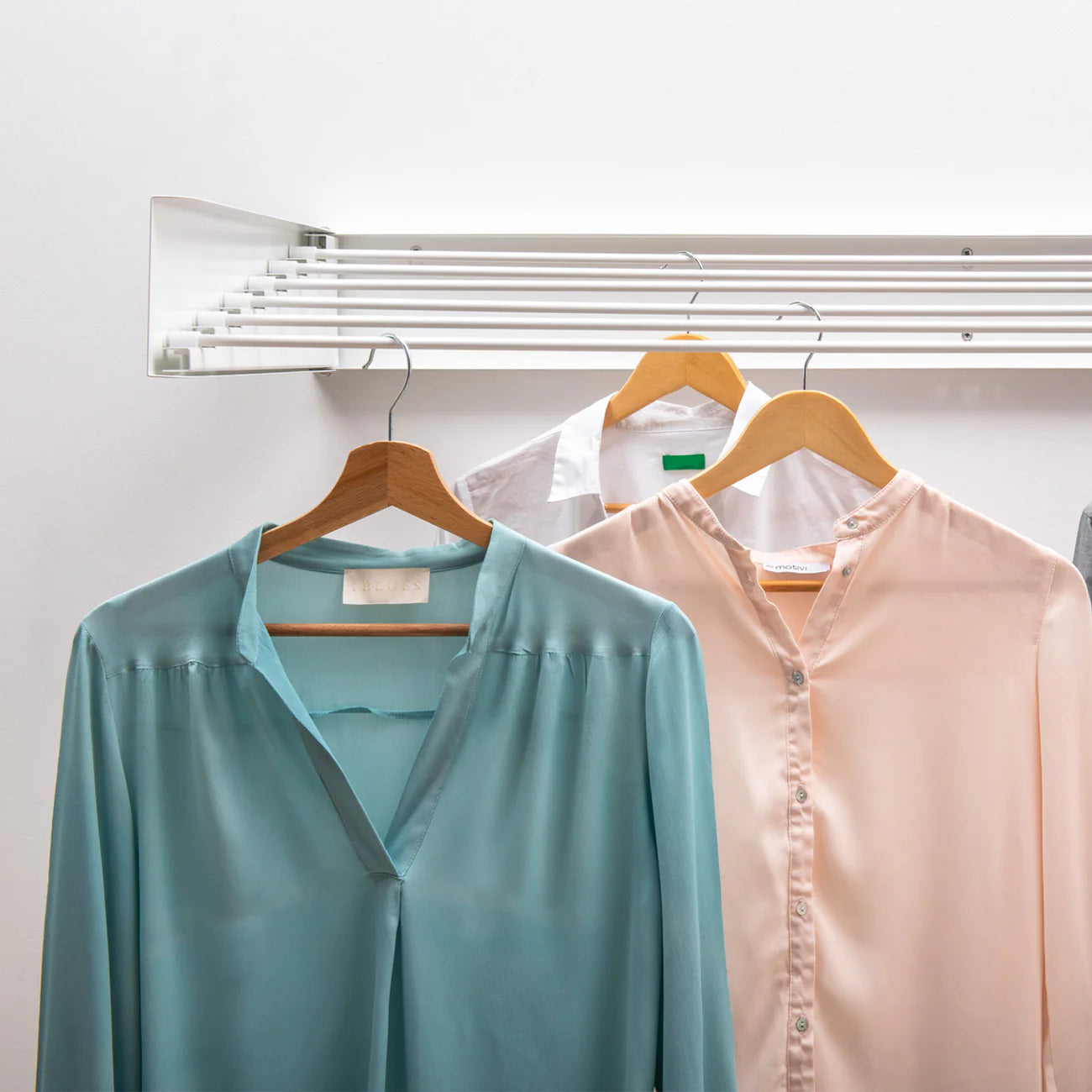 SlimDry™ - Tendedero de pared plegable y ocultable
